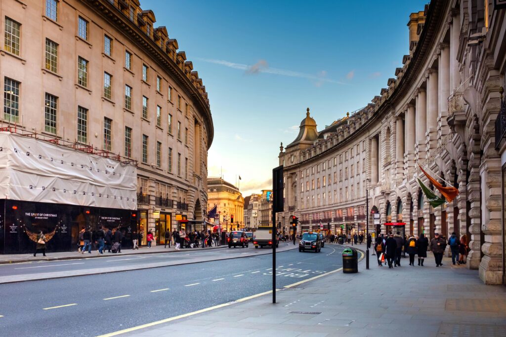 pexels-photo-813362-813362 A bustling view of Regent Street in London with historic architecture and lively street life.